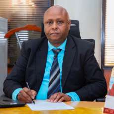 Dr. Peter Karugu